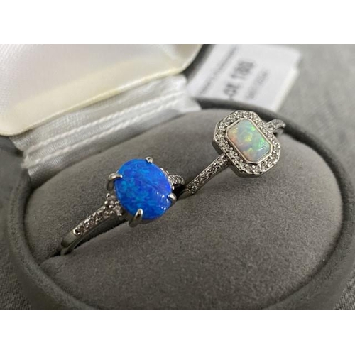 180 - Two 925 silver & opal rings (sizes O & Q)