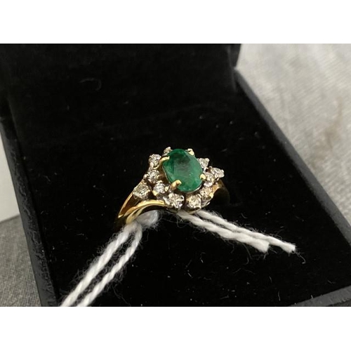 234 - 18ct gold with Columbian emerald and diamond ladies ring (no hallmark but tests for 18ct) 4.3g (Size... 