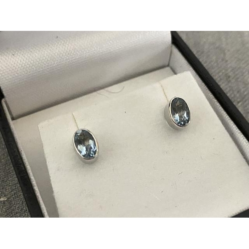 237 - Pair of 9ct white gold & aquamarine earrings