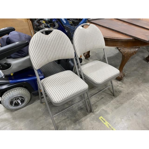 165 - 2 grey metal upholstered folding chairs