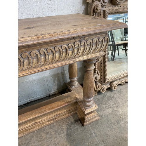 123 - Acacia ‘Oka’ carved console table with 2 drawers 85H 170W 54D and a matching wall mirror 132 x 135cm