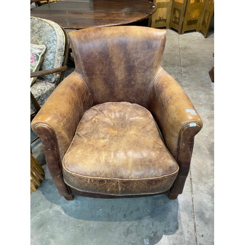 65 - Distressed look brown leather tub chair 73W