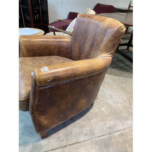 65 - Distressed look brown leather tub chair 73W