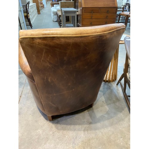 65 - Distressed look brown leather tub chair 73W