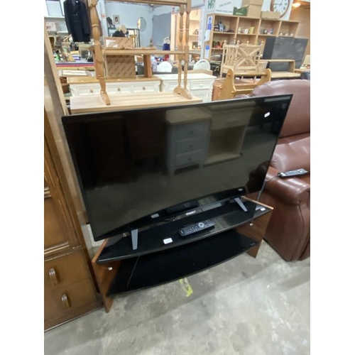 177 - Philips 43PFT4001-05 TV with power lead and remote and a Techlink media stand 45H 101W 50D