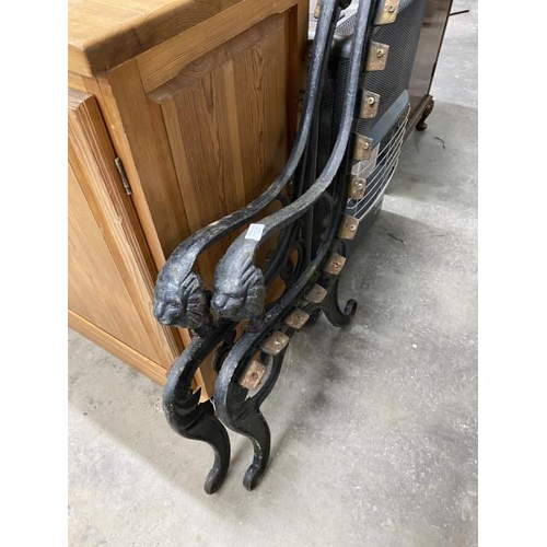 198 - Pair of cast bench ends