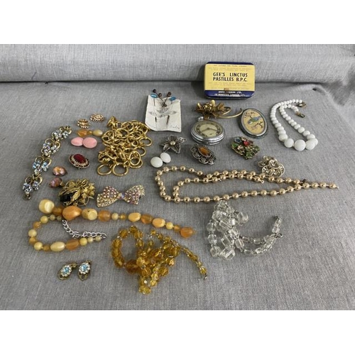 282 - Tub of vintage costume jewellery, Ingersoll Ltd pocket watch, hat pins etc.