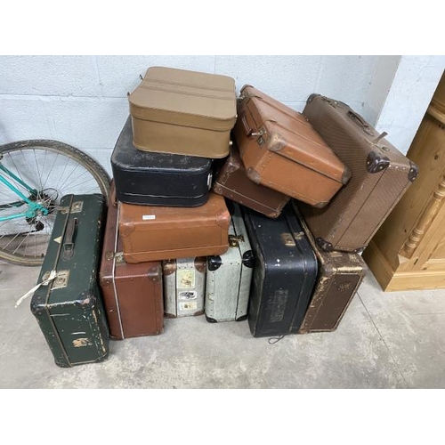 Assorted vintage suitcases in various sizes
