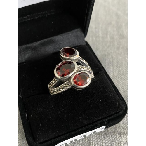 302 - Silver red stone set & marcasite ring (size R)