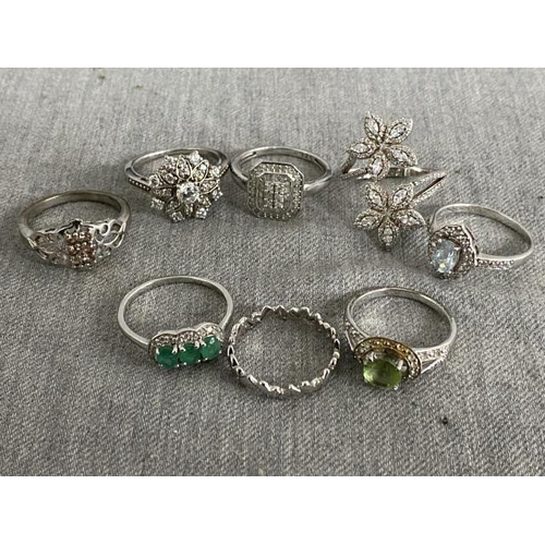 306 - 8 silver rings (various sizes)