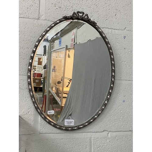 334 - Antique metal oval framed bevel edged mirror 49x37cm