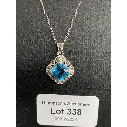 338 - Silver blue stone pendant on silver chain