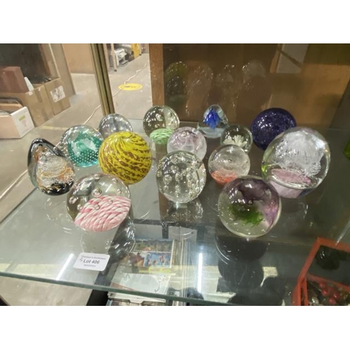 406 - 14 glass paperweights