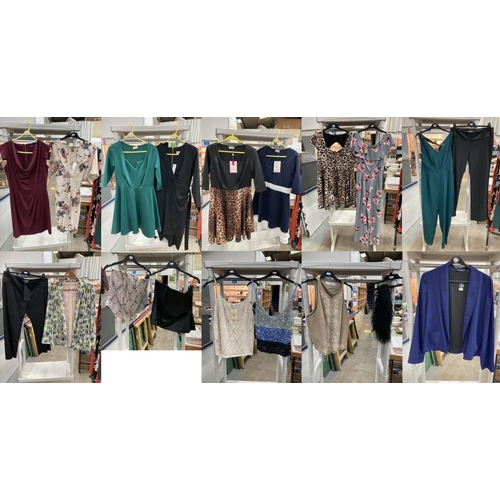 446 - Rail of ladies clothing including 3 Closet dresses (2 new with tags), 3 I want That Trend dresses (2... 