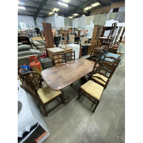 64 - Ercol refectory table 72H 150W 77D and 6 oak ladder back chairs