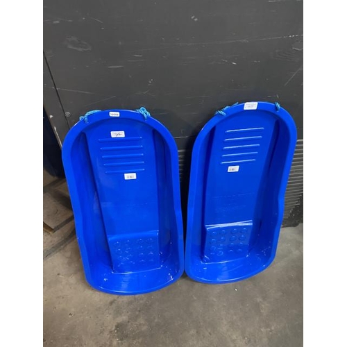 95 - 2 blue plastic sledges (new)