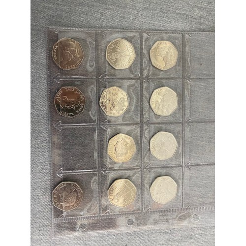 469 - 3 albums of Uk coins including 50p Olympic full set, £2 coins, £1 coins etc