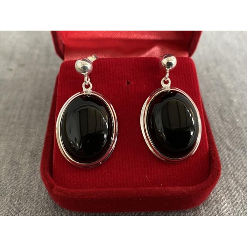 283 - Pair of silver & jet earrings