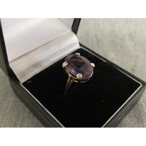 284 - Amethyst set ring, stamped 127 (size J 1/2)