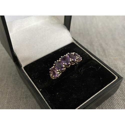 305 - Amethyst 5 stone set ring, stamped 102 (size K 1/2)