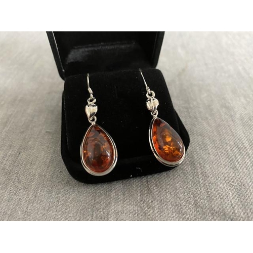 307 - Pair of silver & amber earrings