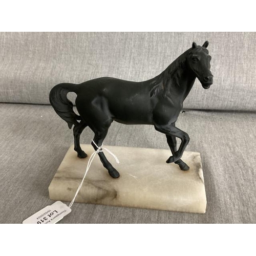 319 - Patinated metal horse figurine on a marble base 14H