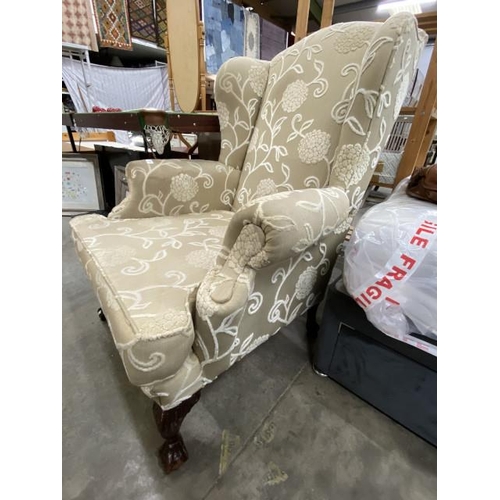 194 - Georgian style wing back armchair with ball and claw feet (fabric will require cleaning) 85W