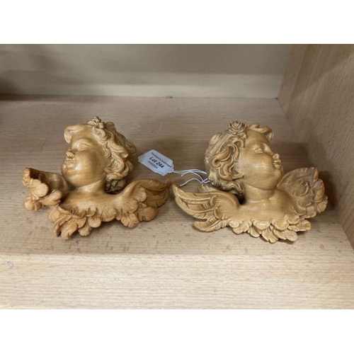 244 - Pair of Cherub Pitti carved wall appliqués