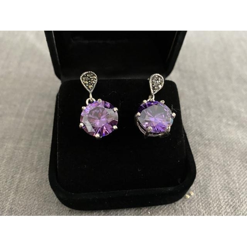 295 - Pair of silver, amethyst & marcasite earrings