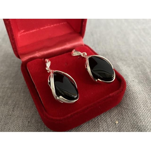 306 - Pair of silver & jet earrings