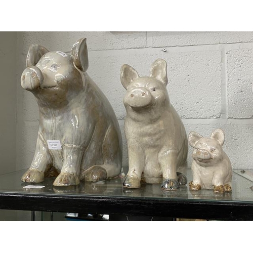 330 - 3 graduated pottery pigs