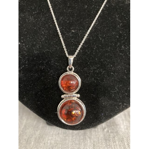 336 - Silver & amber pendant on silver chain