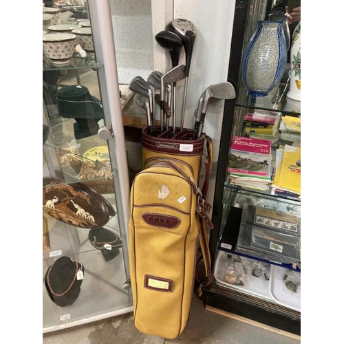 343 - E.J. Price & Son Ltd golf bag, Greentree Scotland 1 & 3 drivers, 8 Spalding Elite golf clubs & 1 oth... 