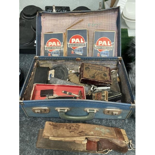 360 - Travel case of cut throat razors, blades, 3 barbers strops, 1950's barber's talcum powder bottle etc... 