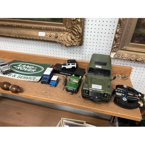 374 - 6 Land Rover models inc. remote control model & Land Rover sign 30x20cm