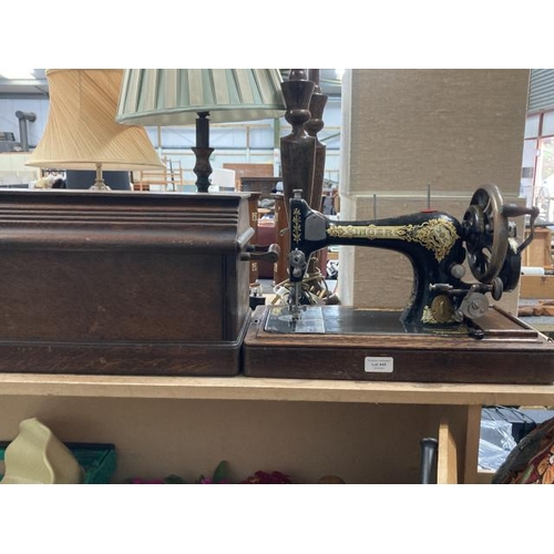 445 - Cased Singer F2338857 manual sewing machine