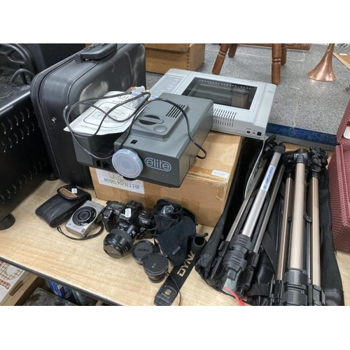 476 - Minolta Dynax 303sl with 2 Sigma convertors for wide XO5 and video camera, Canon IXUS270 with case, ... 