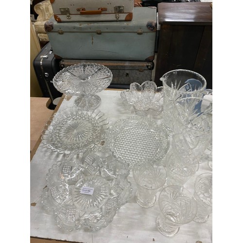 466 - Table top of assorted glass wares including cut glass cake plates, fruit bowls, cordial jugs and gla... 