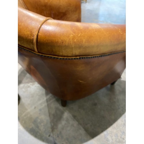 58 - 'Chester's' tan distressed leather tub chair (as found) 77W