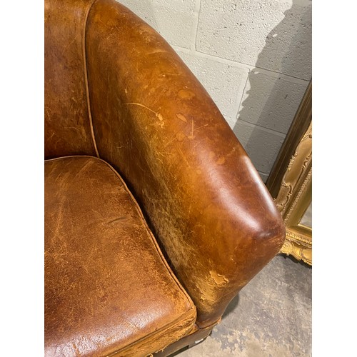 58 - 'Chester's' tan distressed leather tub chair (as found) 77W