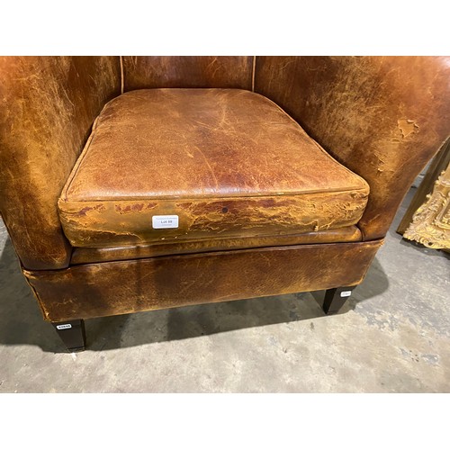 58 - 'Chester's' tan distressed leather tub chair (as found) 77W