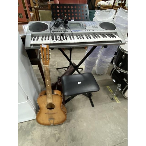 104 - Casio CTK-671 keyboard with stand & stool, guitar (no makers label) and case and a music stand