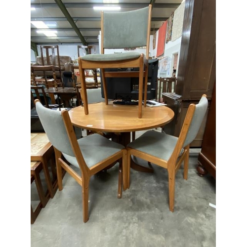 107 - Nathan teak extending table 74H 100cm diameter and 4 chairs