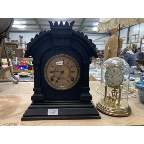 392 - Antsonia wooden cased mantle clock with key and pendulum and a Kundo anniversary clock under dome (n... 