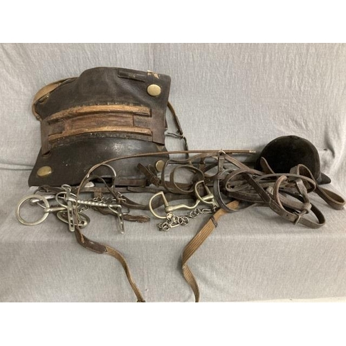 400 - Leather & brass horse harness, Christy's London velvet equine showing hat, bridle, head collar, 4 va... 