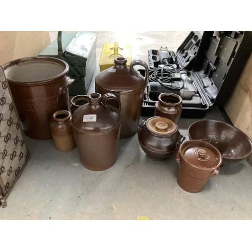 402 - Assorted earthenware jars & bottles