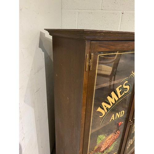 54 - James Purdey and Sons glazed cabinet with shelves to the interior 124H 100W 40D