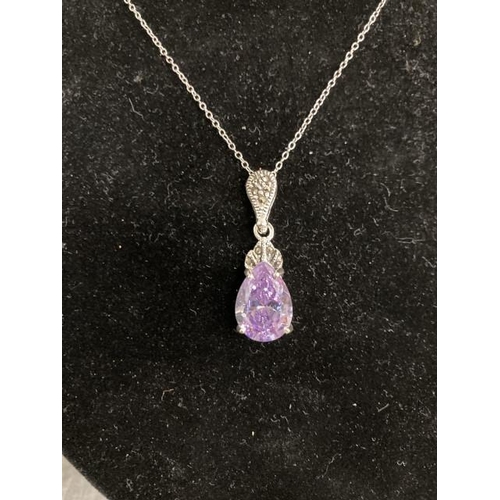 460 - Silver, amethyst & marcasite pendant on silver neck chain