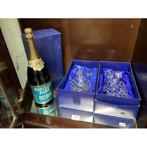 498 - 2 boxed Cossack lead Crystal decanters & a bottle of Herbert Beaufort champagne brut 'Barclays Bank ... 