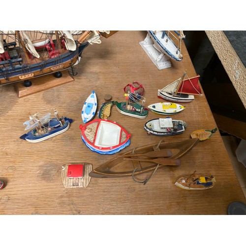 484 - Collection of model fishing boats & figures